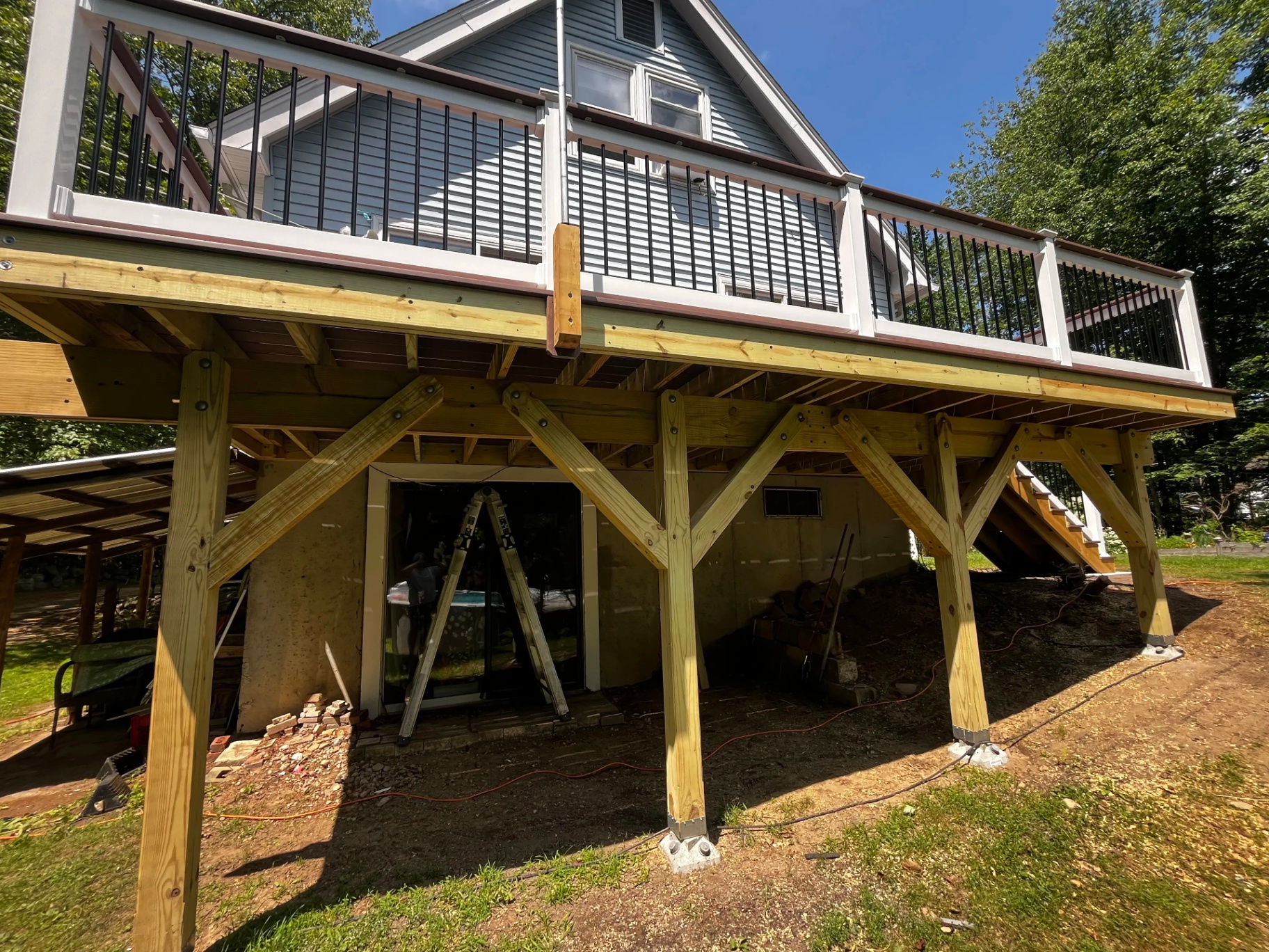 Deck Builder in Nottingham, NH: Elevated Wolf Composite Deck Project (2026 Showcase)